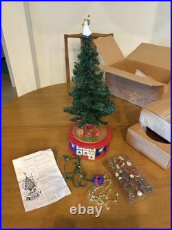 1996 Avon Christmas Is Coming Musical Revolving Advent Tree 100% Complete
