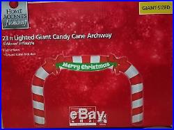 276.38 in W 39.37 in D 179.92 in H Lighted Inflatable Archway Candy Cane 23 ft