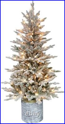 4.5ft Pre-Lit Potted Flocked Arctic Fir Christmas Tree with 70 Clear Lights