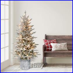 4.5ft Pre-Lit Potted Flocked Arctic Fir Christmas Tree with 70 Clear Lights