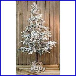 5 1/2 foot tall flocked snowy cedar Christmas tree with pinecones