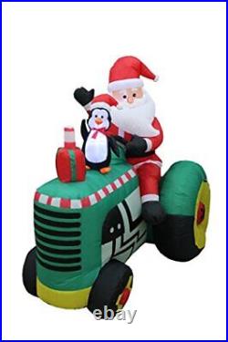 5.3 Foot Tall Christmas Inflatable Santa Claus Drive Tractor with Penguin LED