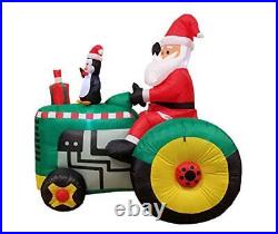 5.3 Foot Tall Christmas Inflatable Santa Claus Drive Tractor with Penguin LED