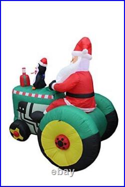 5.3 Foot Tall Christmas Inflatable Santa Claus Drive Tractor with Penguin LED