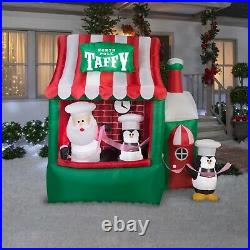 7.5′ Gemmy Airblown Animated Inflatable Santa Claus North Pole Taffy Stand Scene