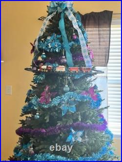 7.5' Pre-Lit Radiant Micro LED Artificial Christmas Tree 7.5' Pre-Lit Radiant Micro LED Artificial Christmas Tree