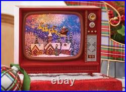 9.75 SANTA FLYING OVER TOWN MUSICAL LIGHTED WATER TV Christmas NEW RAZ 4200757