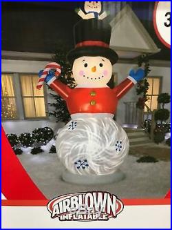Animated 12' Snowman with Pop-Up Baby Airblown Inflatable by Gemmy