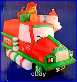 Celebrations Inflatable Airblown 7.5′ Christmas Santa Claus in Fire Truck Engine