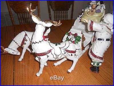 Ceramic Santa, Sleigh, and Reindeers