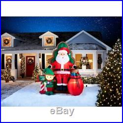 Christmas Gemmy 10 ft Photo with Santa in Chair withElf & Bag of gifts Inflatable