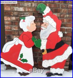 Christmas Santa Claus & Mrs. Claus kissing under the Mistletoe Wood Outdoor Yard