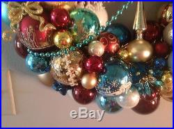 Christmas ornament wreath. Sophisticated color palette. Burgandy, teal, white
