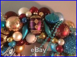 Christmas ornament wreath. Sophisticated color palette. Burgandy, teal, white