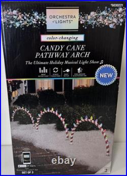 Gemmy Orchestra of Lights Color-Changing Candy Cane Pathway Arch Musical New