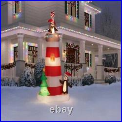 Home Accents Holiday 7.5 FT LED Lighthouse with Beacon and Penguins Holiday Infl