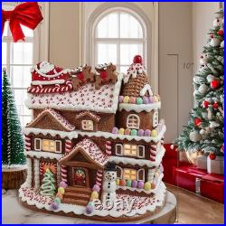 Kurt Adler 10-inch Pre-Lit Gingerbread House with Santa Kurt Adler 10-inch Pre-Lit Gingerbread House with Santa