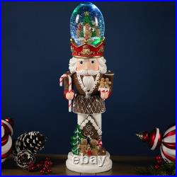 LED Lighted Gingerbread Nutcracker Musical Christmas Snow Globe 17.5