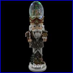 LED Lighted Gingerbread Nutcracker Musical Christmas Snow Globe 17.5