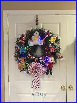 Light up Christmas wreath featuring Rudolph the Red-Nosed Reindeer and Friends