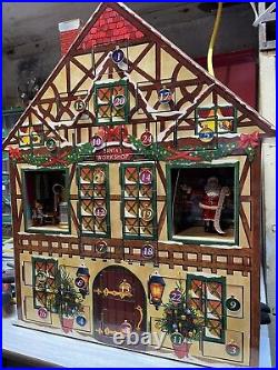 Mr Christmas Santa’s Workshop Animated Musical Advent House Calendar Works Great