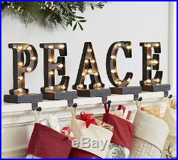 Pottery Barn LIT BRONZE WORD STOCKING HOLDER-PEACE-LIT UP-NEW IN ORIGINAL BOX