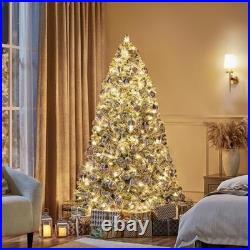 Pre-Lit Snow Flocked Artificial Christmas Tree with White and Multicolor Lights Pre-Lit Snow Flocked Artificial Christmas Tree with White and Multicolor Lights