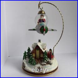 Santa's Fly by Snowglobe by Christopher Radko Christmas Music Box Airplane