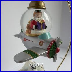 Santa's Fly by Snowglobe by Christopher Radko Christmas Music Box Airplane