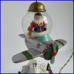 Santa's Fly by Snowglobe by Christopher Radko Christmas Music Box Airplane