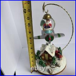 Santa's Fly by Snowglobe by Christopher Radko Christmas Music Box Airplane