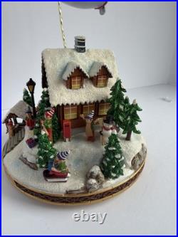 Santa's Fly by Snowglobe by Christopher Radko Christmas Music Box Airplane