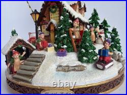 Santa's Fly by Snowglobe by Christopher Radko Christmas Music Box Airplane