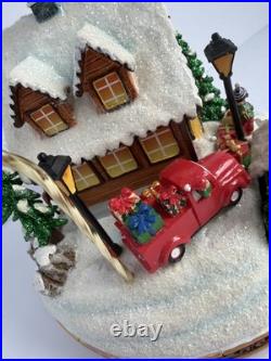 Santa's Fly by Snowglobe by Christopher Radko Christmas Music Box Airplane