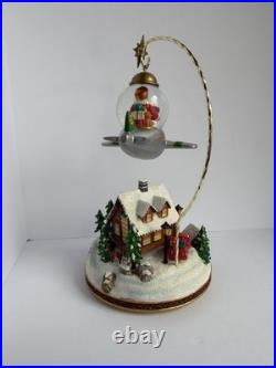 Santa's Fly by Snowglobe by Christopher Radko Christmas Music Box Airplane