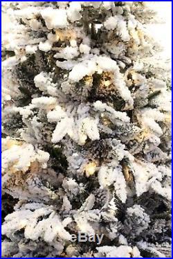 Snowy Spruce Artificial Flocked Christmas tree prelit with LED light snow white
