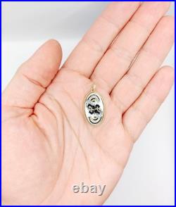 Vintage 14k gold Meissen porcelain pendant with floral decoration