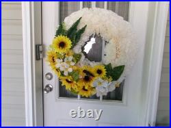 Wreath hanger for front door about 25 wide. Huge. Birds n sunflowers